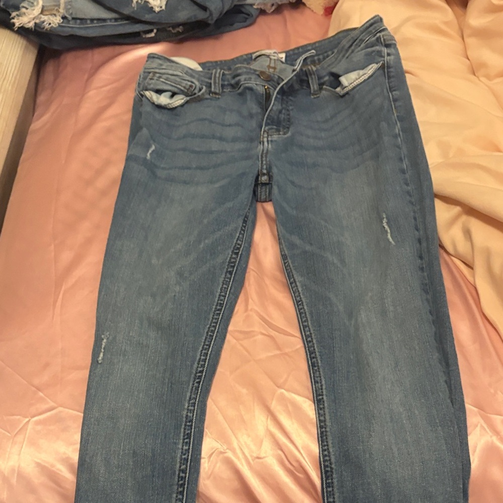 Blue Skinny Jeans with Distressed Details